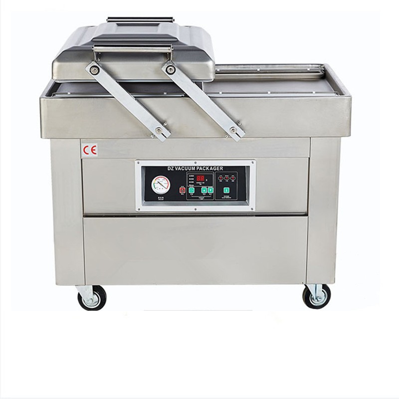 Double chamber vacuum sealing machine